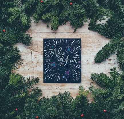 green Christmas decor with New Year greetings